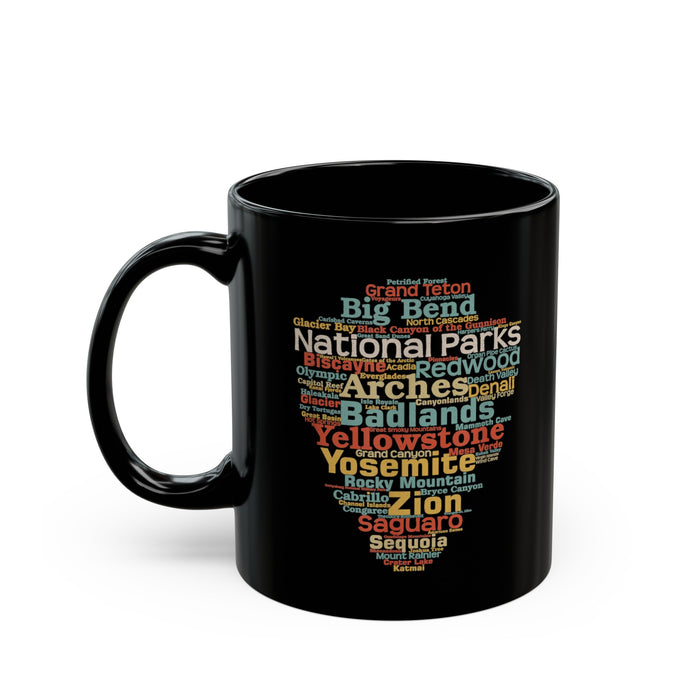 Ceramic souvenir mug featuring a scenic national park design, displayed on a kitchen counter.