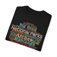 T-shirt featuring a word cloud design with names of various USA national parks.