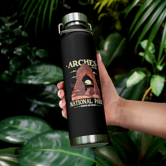 Image of a stainless steel water bottle featuring a design from Arches National Park in Utah.