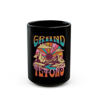 Grand Tetons National Park souvenir mug featuring a sunrise and mountain design.