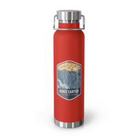 Red stainless steel water bottle with a scenic design of Kings Canyon National Park.