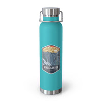 Mint green stainless steel water bottle with a scenic design of Kings Canyon National Park.