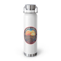 Grand Canyon National Park souvenir water bottle featuring a sunset landscape design and stainless steel construction.