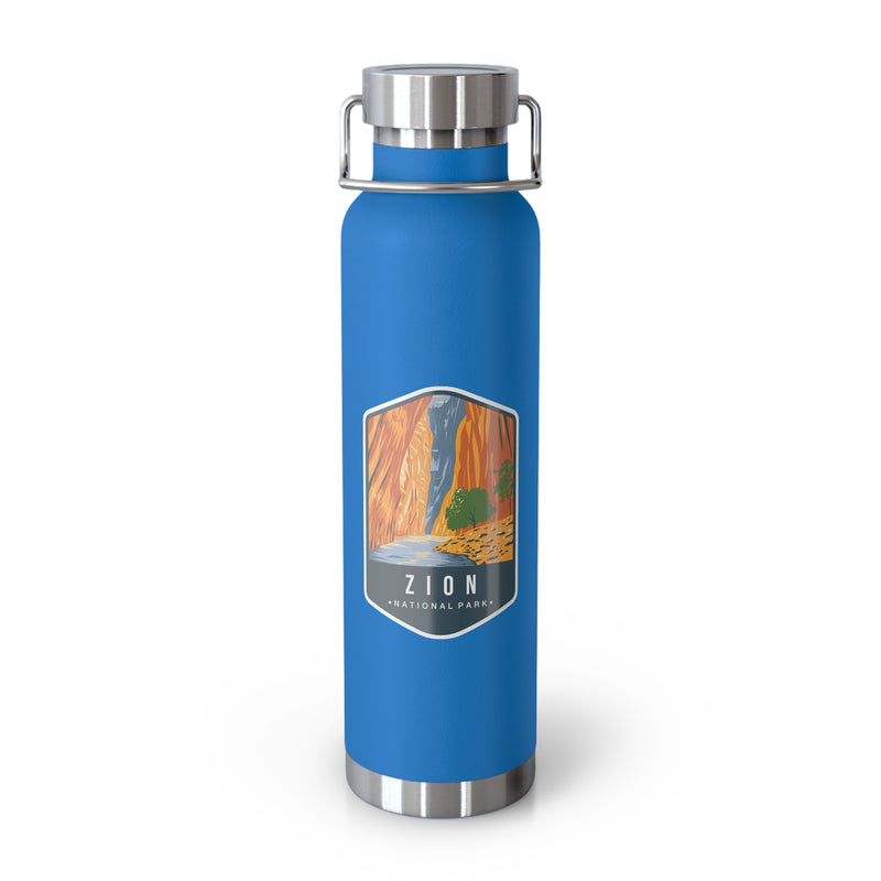 Pebble Blue stainless steel water bottle featuring a design of Zion National Park with a waterfall and canyon scenery.