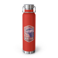 Red stainless steel water bottle featuring a design of Wind Cave National Park with cave formations.