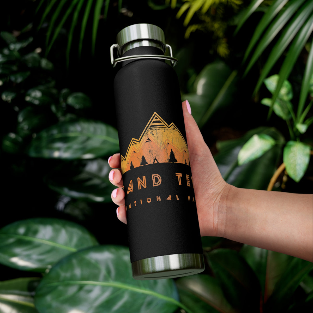 Grand Teton National Park souvenir water bottle featuring a mountain art design with stainless steel construction.