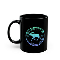 Grand Teton National Park souvenir mug featuring a moose and "Est. 1929" design.