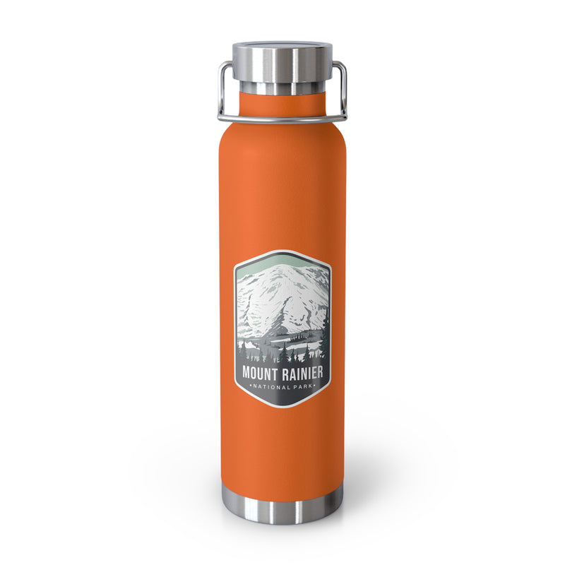 Orange stainless steel water bottle with a scenic design of Mount Rainier National Park.