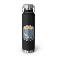 Black stainless steel water bottle with a scenic design of Kings Canyon National Park.