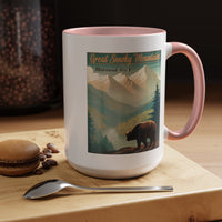 15 oz pink ceramic mug featuring an illustration of a bear in Great Smoky Mountains National Park with mountains and trees in the background.