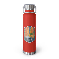 Red stainless steel water bottle featuring a design of Zion National Park with a waterfall and canyon scenery.