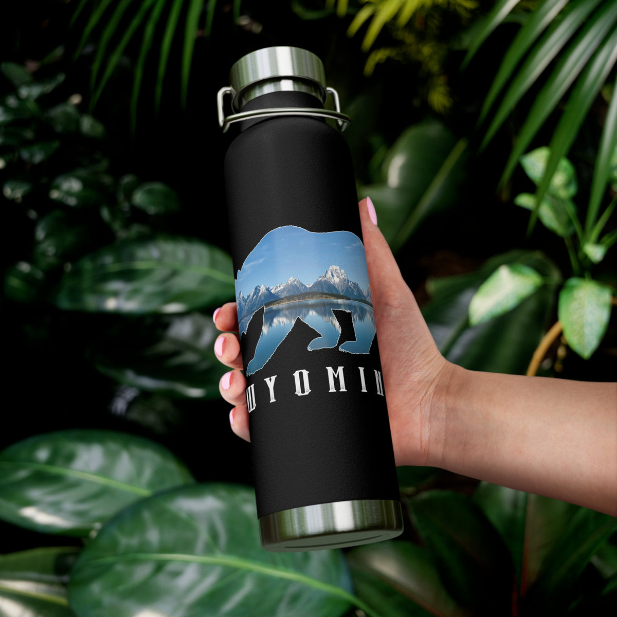 Grand Teton National Park souvenir water bottle featuring a bear scene design with stainless steel construction.