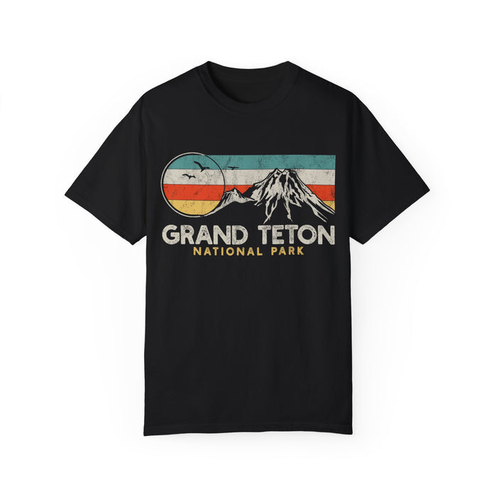 Grand Teton National Park T-shirt featuring a retro mountain graphic design with colorful stripes.