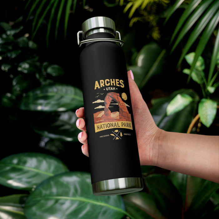 Image of a stainless steel water bottle featuring a design from Arches National Park in Utah.