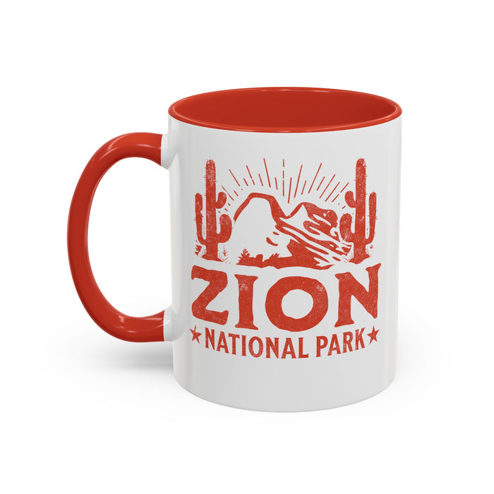 11 oz ceramic mug with red contrasting handle featuring a cactus design of Zion National Park, perfect as a souvenir.