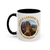 White ceramic mug with a contrasting handle and interior, featuring an image of Angels Landing Trail in Zion National Park with a mountain landscape design.