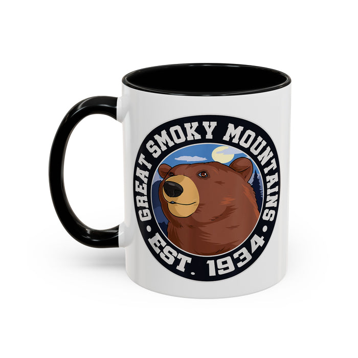 11 oz black ceramic mug featuring an illustration of a bear with the text "Great Smoky Mountains Est. 1934."