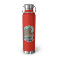 Red stainless steel water bottle featuring a design of Pinnacles National Park with rock formations.