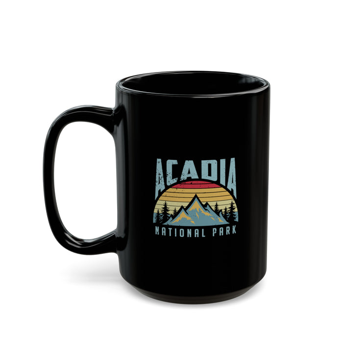 Ceramic coffee mug with a vintage design featuring Acadia National Park and a mountain silhouette.