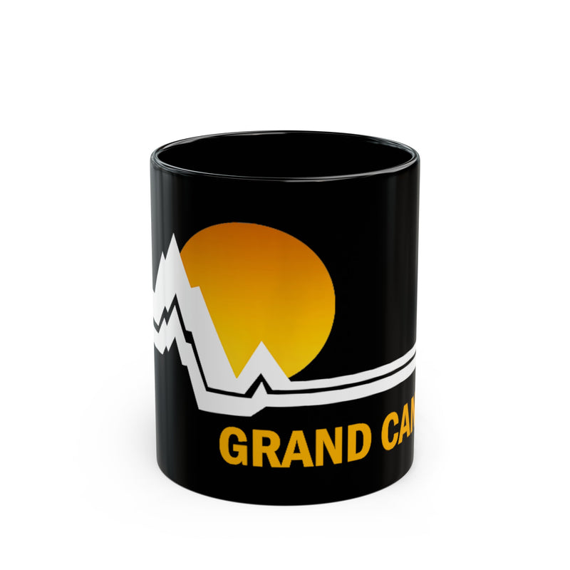 Grand Canyon National Park souvenir mug featuring a sunset and mountain design.