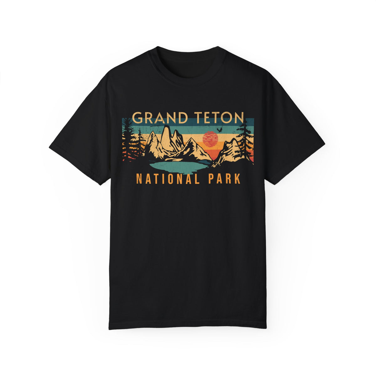 Grand Teton National Park T-shirt featuring a scenic sunset graphic design with mountains and trees.