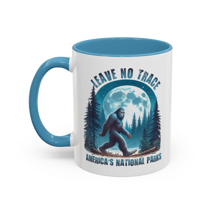 11 oz light blue ceramic mug with Bigfoot graphic and "Leave No Trace" text, featuring Yosemite National Park scenery.