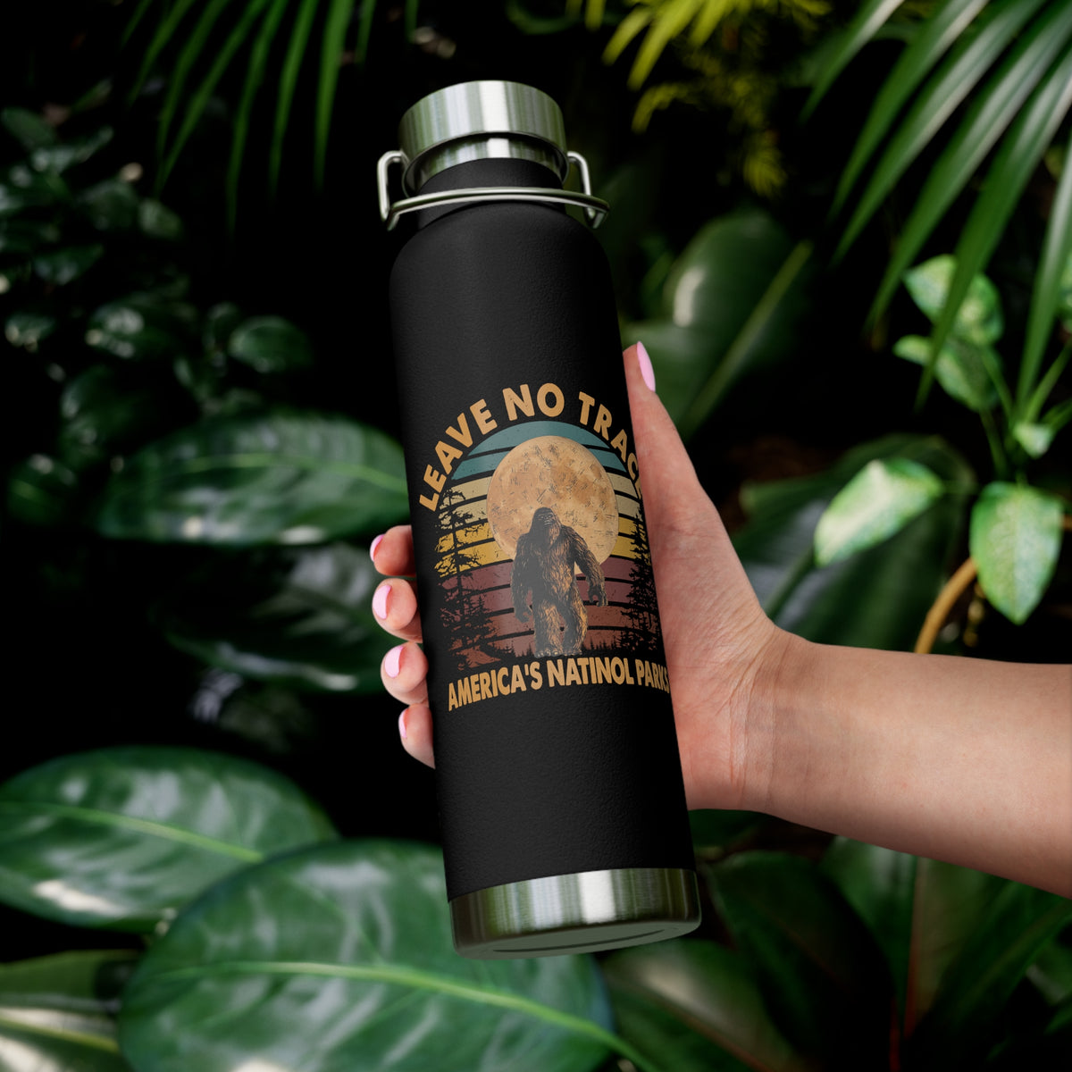 Water bottle with Leave No Trace design featuring a bear and forest scene under a full moon, promoting America's national parks.