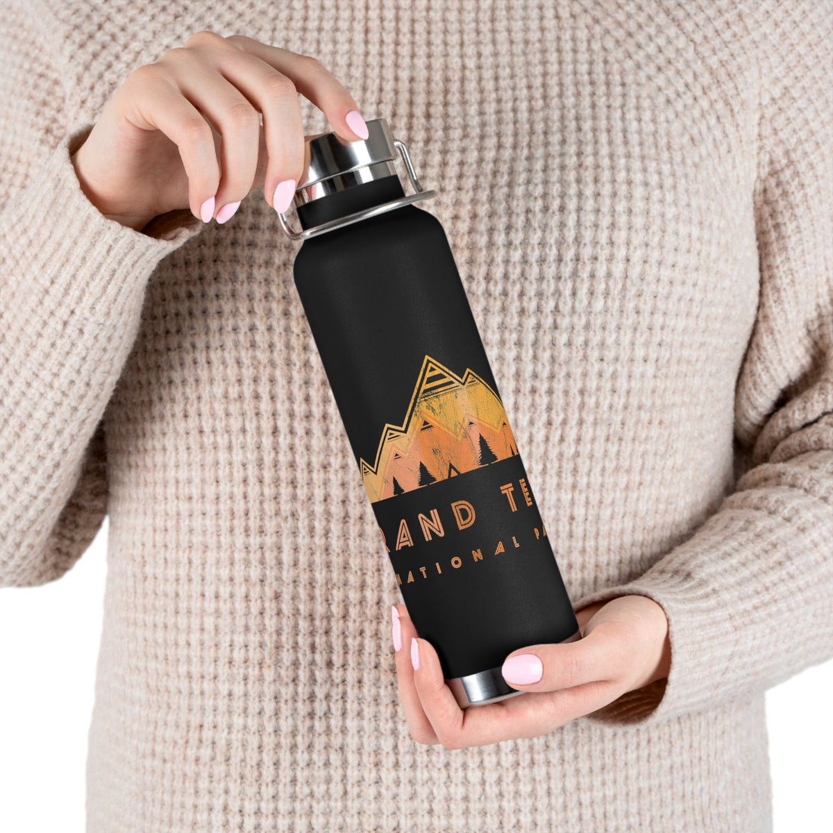 Grand Teton National Park souvenir water bottle featuring a mountain art design with stainless steel construction.