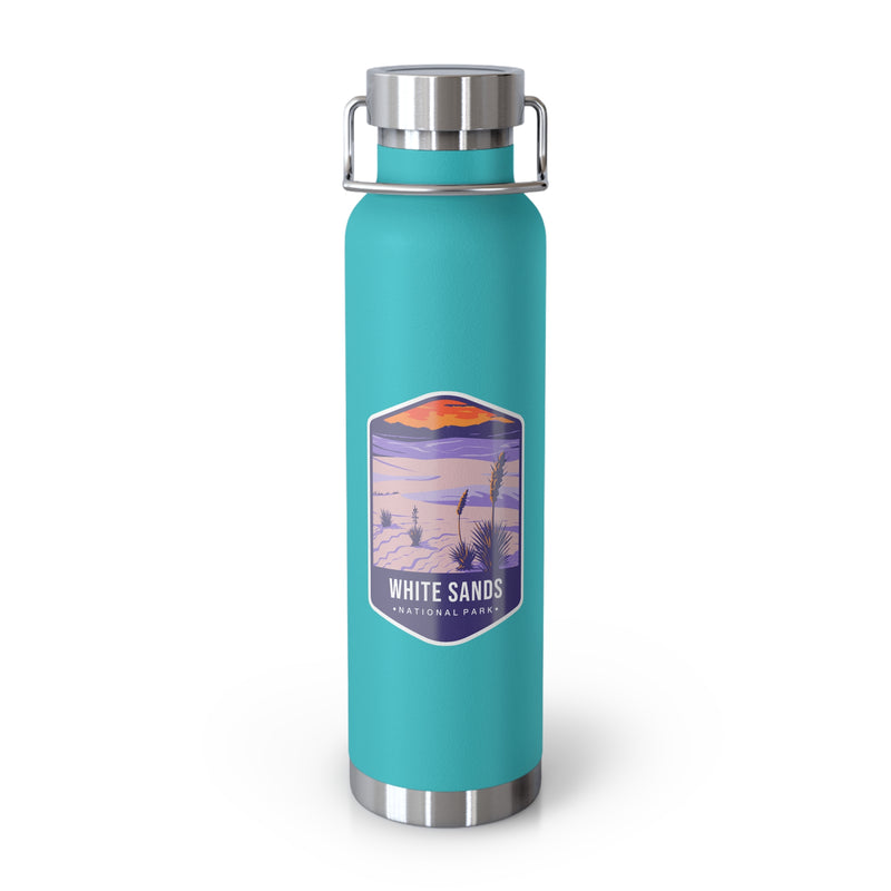 Green Mint stainless steel water bottle featuring a design of White Sands National Park with desert and sunset scenery.