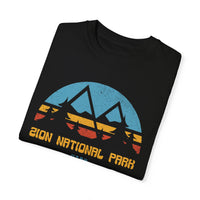 T-shirt featuring a silhouette design of Zion National Park with mountains and trees.