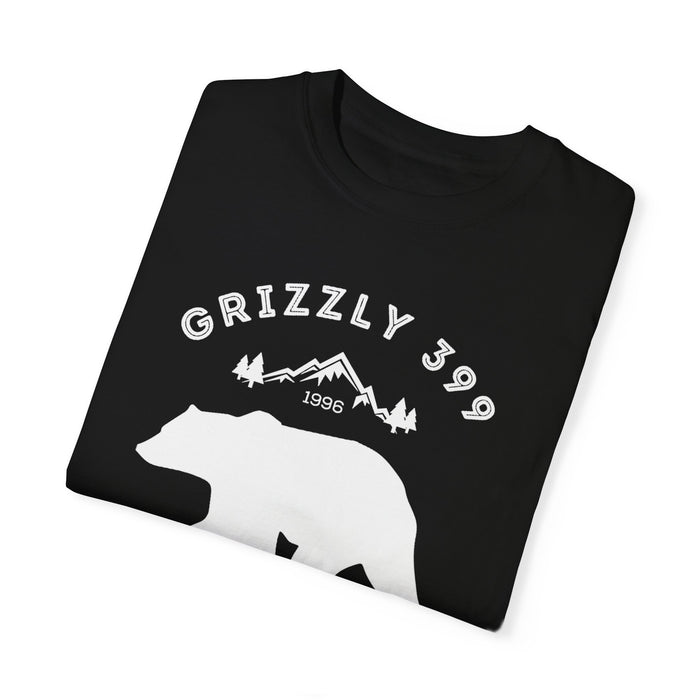 Grand Teton National Park T-shirt featuring a graphic design with Grizzly 399, mountains, and "Wild and Free" text.