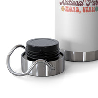 Image of a stainless steel water bottle featuring a design from Arches National Park in Moab, Utah.