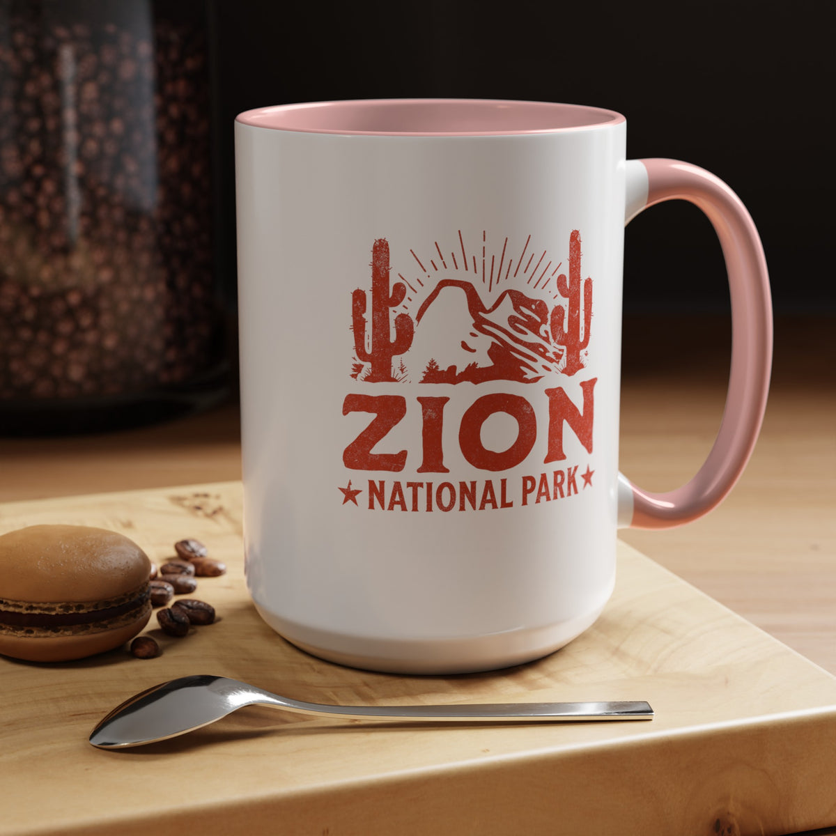 15 oz ceramic mug with pink contrasting handle featuring a cactus design of Zion National Park, perfect as a souvenir.