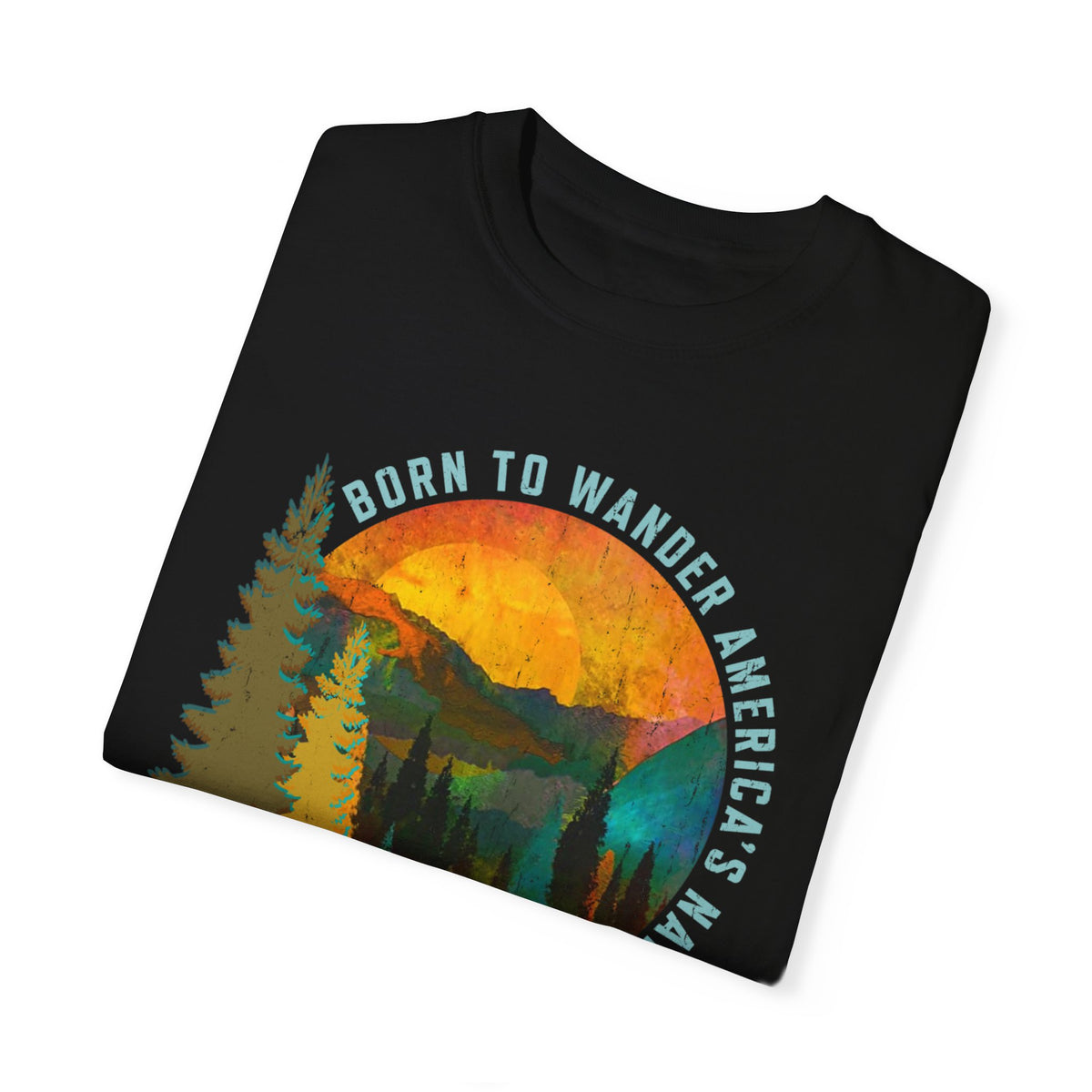 T-shirt featuring a scenic sunset with mountains and trees, and text "Born to Wander America's National Parks."