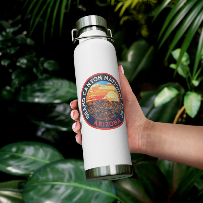 Grand Canyon National Park souvenir water bottle featuring a sunset landscape design and stainless steel construction.