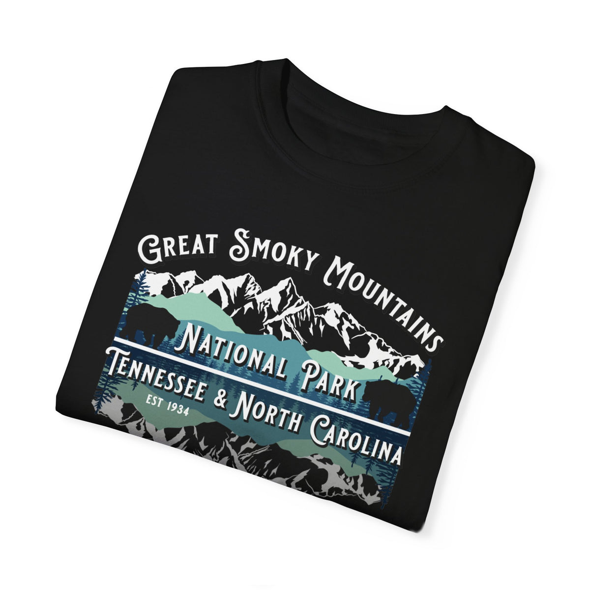 A T-shirt featuring a scenic design of the Great Smoky Mountains with a mountain range and text reading "Great Smoky Mountains National Park, Tennessee & North Carolina."