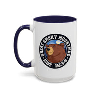 15 oz navy ceramic mug featuring an illustration of a bear with the text "Great Smoky Mountains Est. 1934."