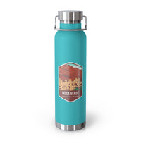 Mint green stainless steel water bottle with a scenic design of Mesa Verde National Park.