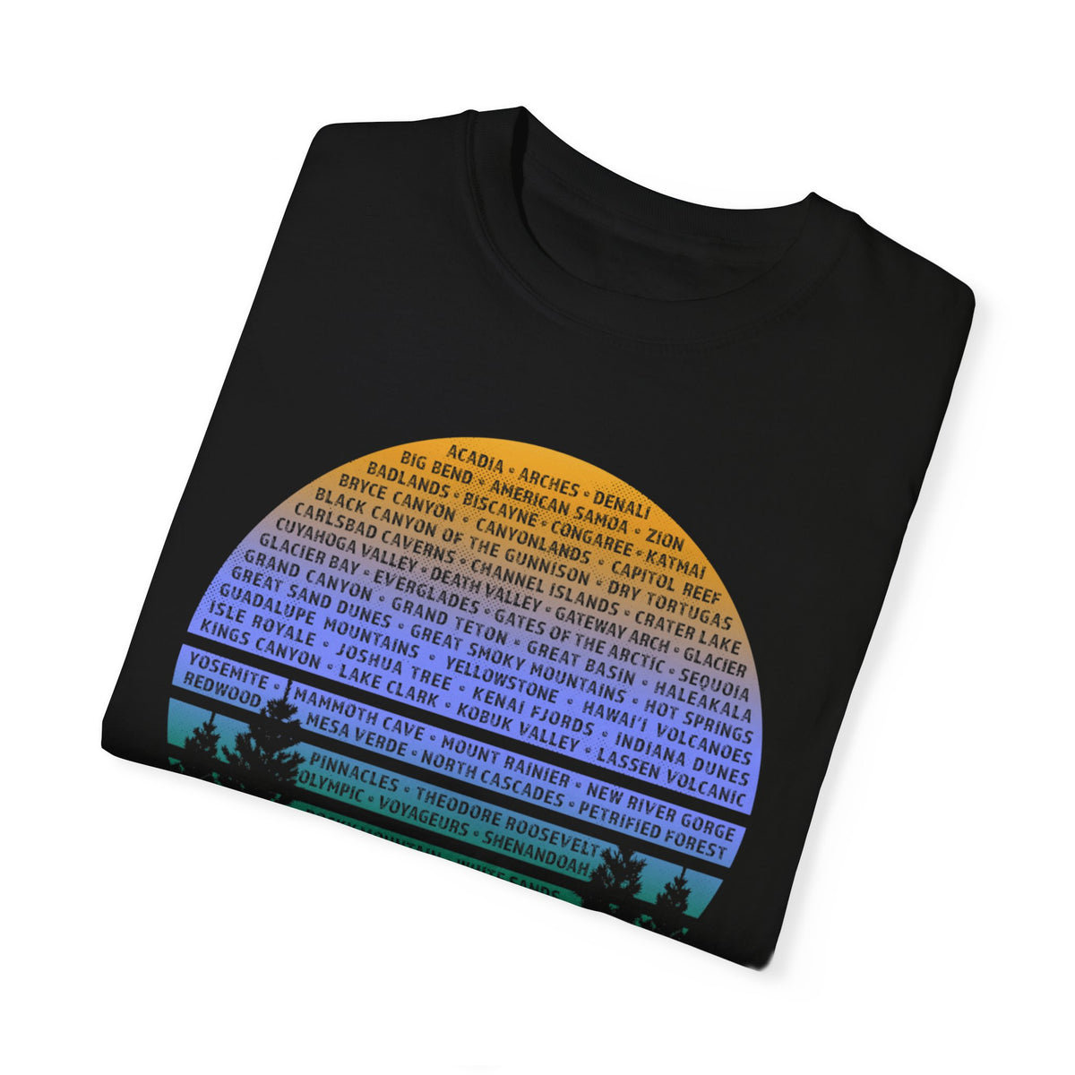 T-shirt featuring the names of US National Parks in a colorful text design.