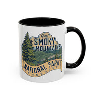 11 oz black ceramic mug featuring an illustration of Great Smoky Mountains National Park with a scenic view and trees, labeled Tennessee.