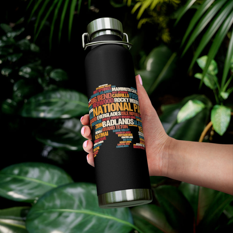 22oz vacuum insulated stainless steel water bottle with a word cloud design featuring names of various national parks.