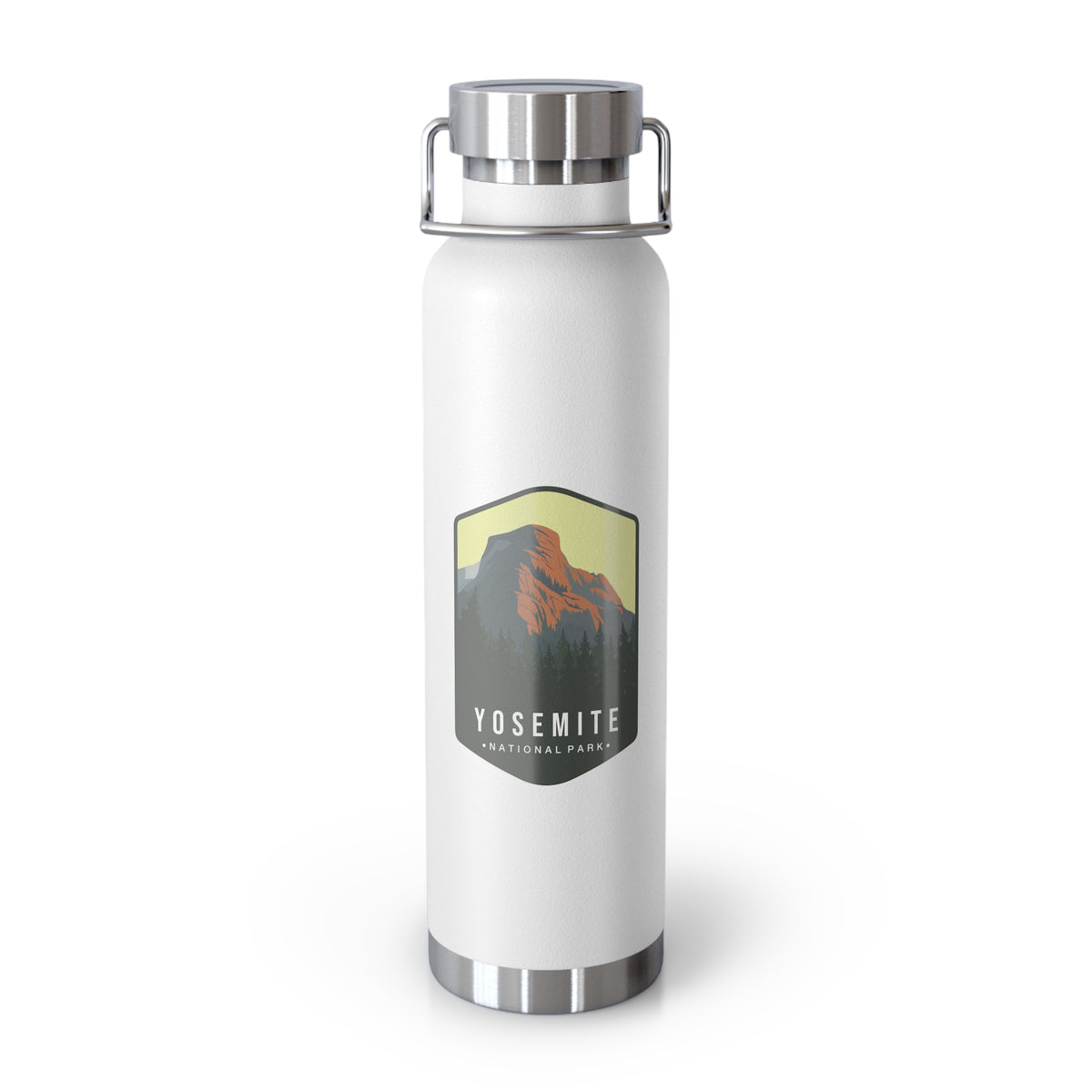 White stainless steel water bottle featuring a design of Yosemite National Park with a mountain and forest scenery.