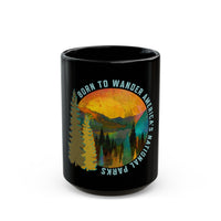 Ceramic mug featuring a scenic design with trees, mountains, and the text "Born to Wander America's National Parks."