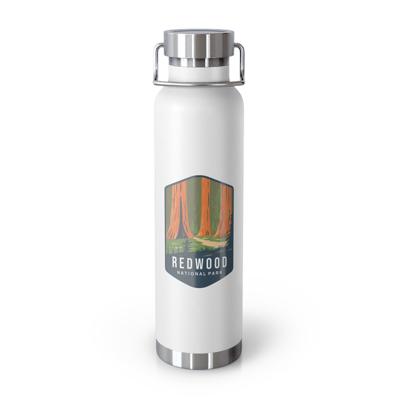 White stainless steel water bottle featuring a design of Redwood National Park with towering redwood trees.