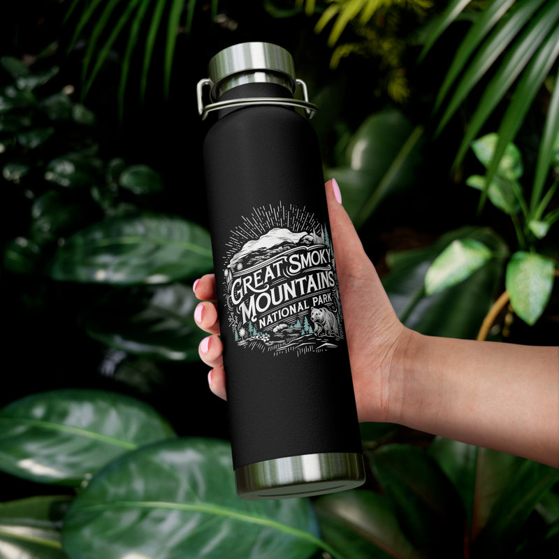 Image of an insulated souvenir bottle featuring a nature-themed design with the text "Great Smoky Mountains National Park, Tennessee & North Carolina."