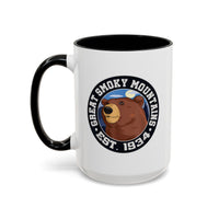 15 oz black ceramic mug featuring an illustration of a bear with the text "Great Smoky Mountains Est. 1934."