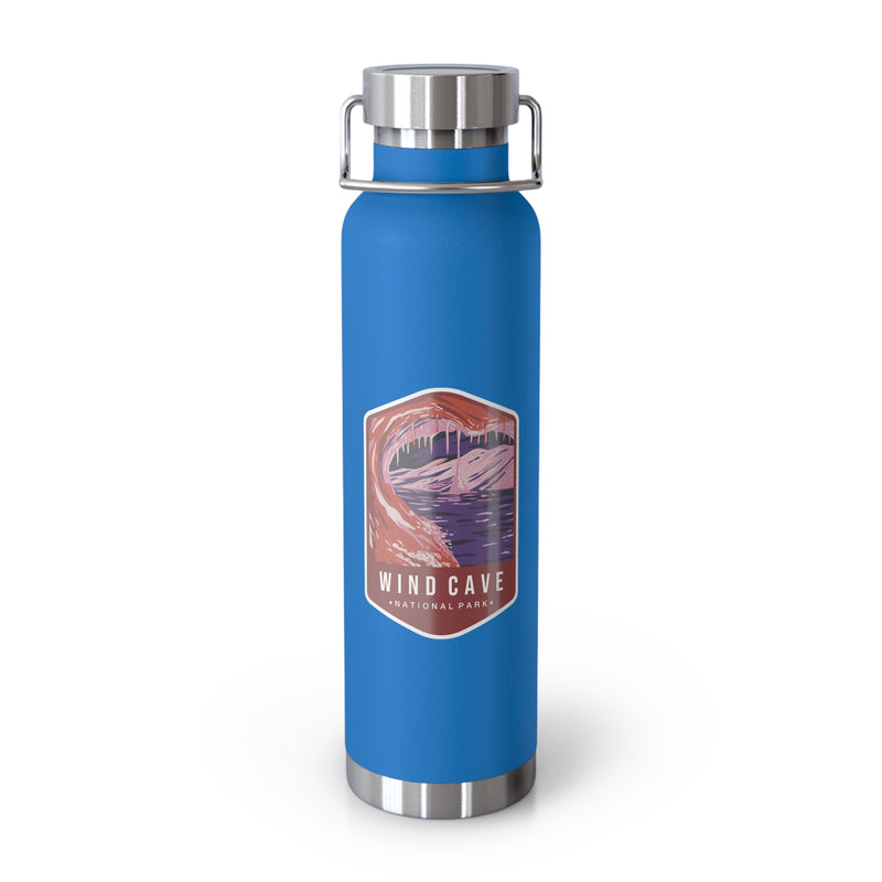 Pebble Blue stainless steel water bottle featuring a design of Wind Cave National Park with cave formations.