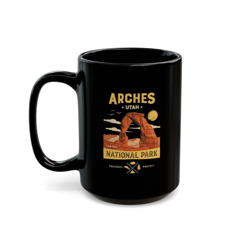 Ceramic mug featuring a scenic illustration of the iconic arch in Arches National Park, Utah, with a contrasting handle.