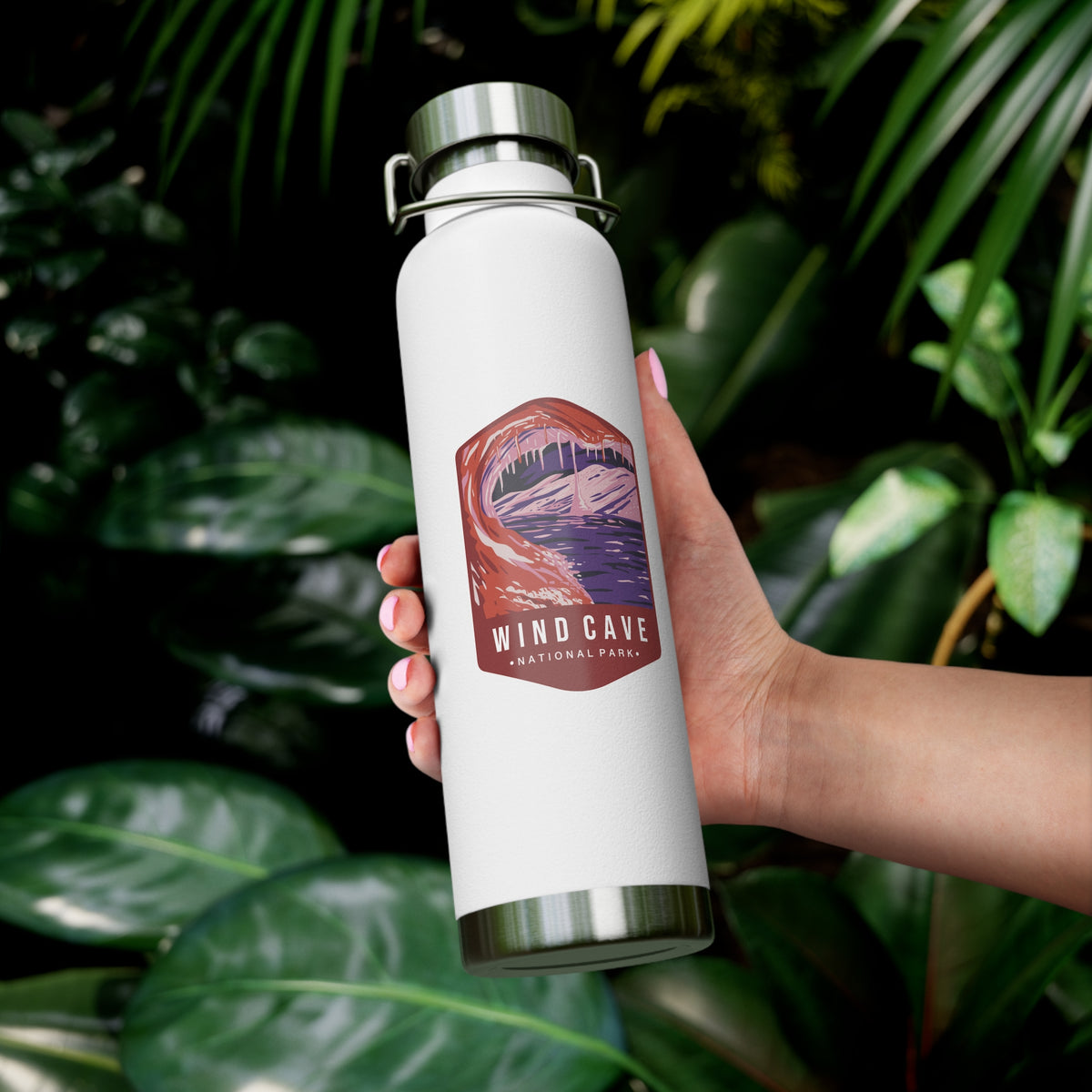 White stainless steel water bottle featuring a design of Wind Cave National Park with cave formations.