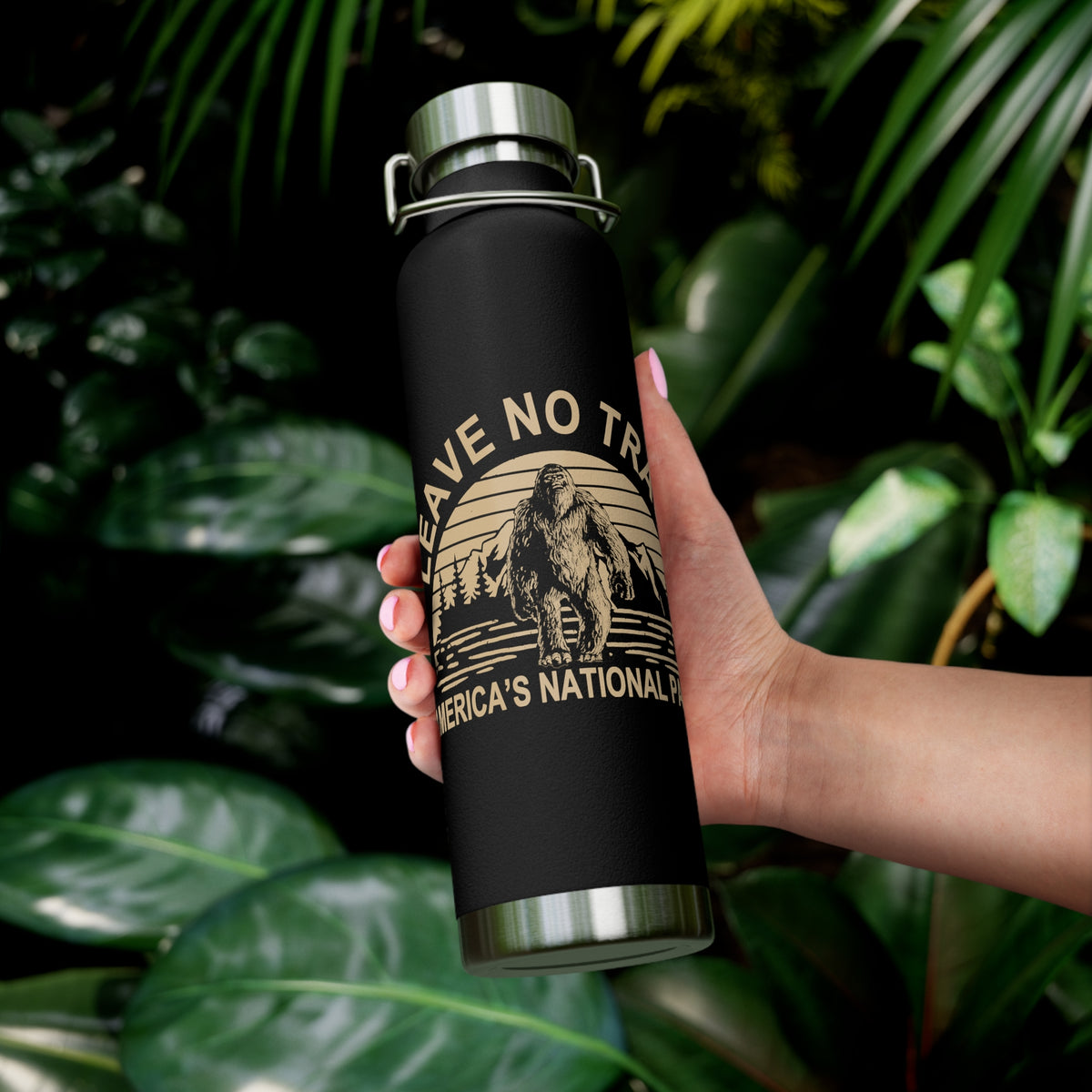 Water bottle featuring a Leave No Trace design with a bear and mountain landscape, promoting conservation in America's national parks.